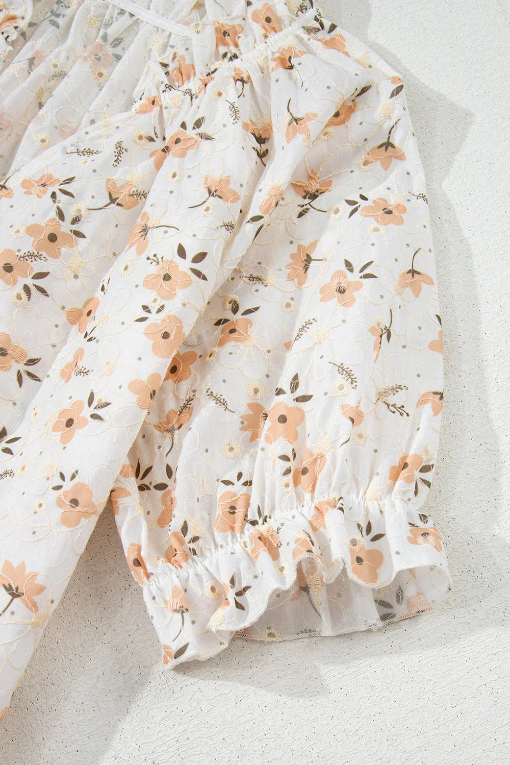Yshel – Bluse mit Blumenmuster und Puffärmeln