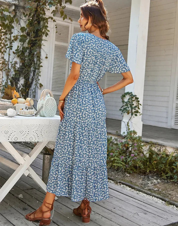 Valkynne – Elegantes Midikleid mit Blumenmuster und Knopfleiste