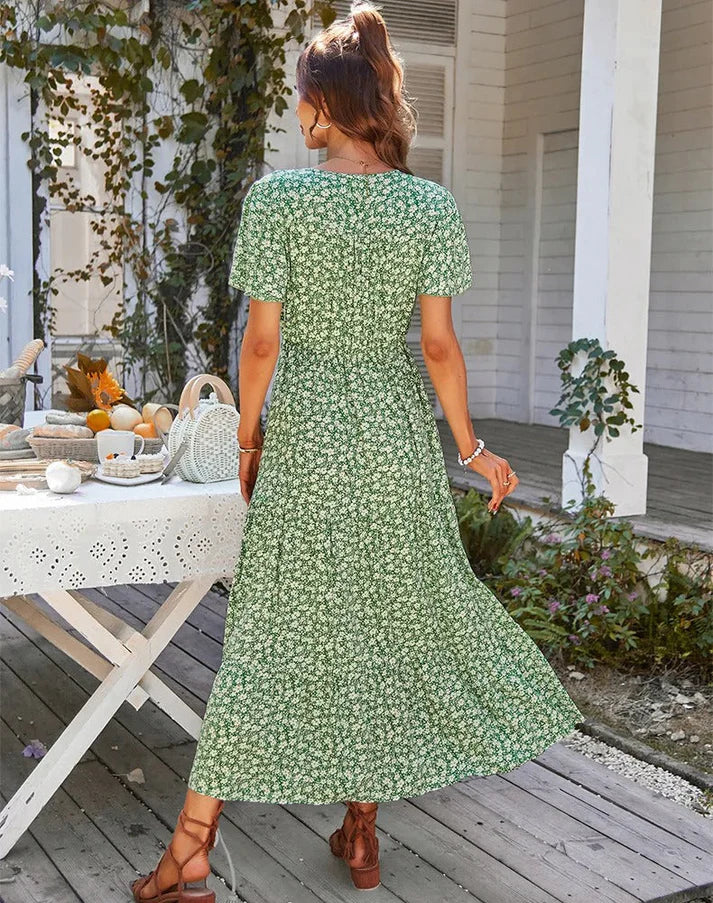 Valkynne – Elegantes Midikleid mit Blumenmuster und Knopfleiste