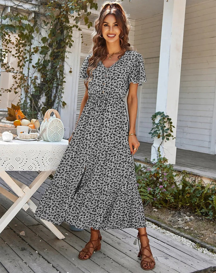 Valkynne – Elegantes Midikleid mit Blumenmuster und Knopfleiste