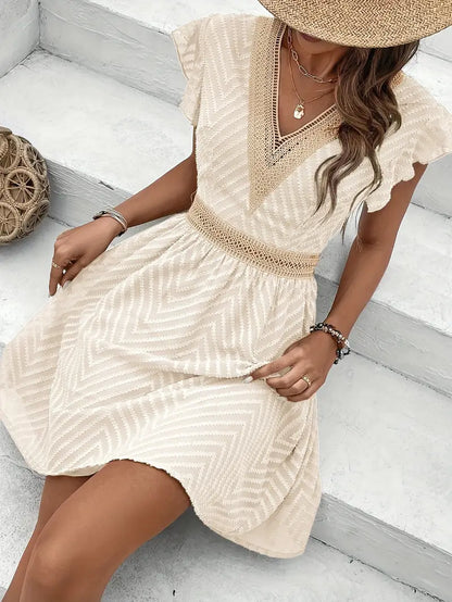 Yoshi – Boho-Minikleid mit V-Ausschnitt und Struktur