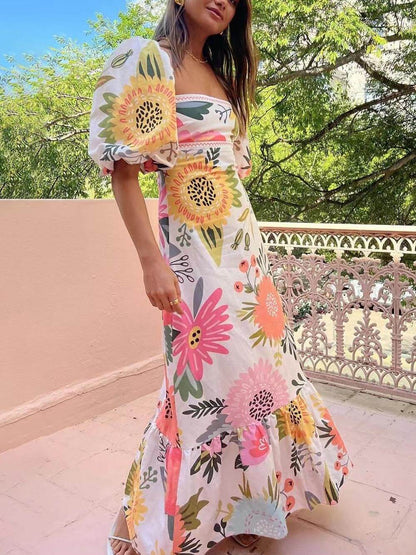 Quoree – Maxikleid mit Blumenmuster und Puffärmeln