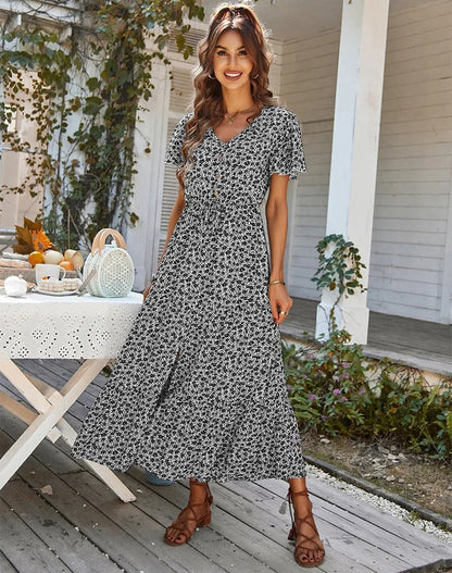Valkynne – Elegantes Midikleid mit Blumenmuster und Knopfleiste