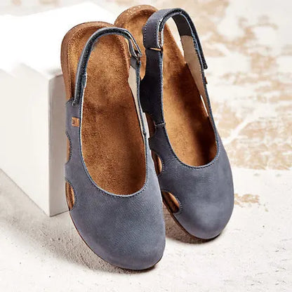 Ravena – Flache Ledersandalen mit Fersenriemen