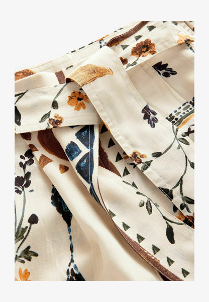DJAMILA - Hose - Sonnenblumenprint